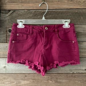 Magenta color jean cut off shorts